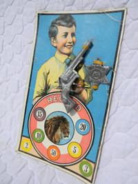 Antique toy cap gun pistol and sheriff badge - original package