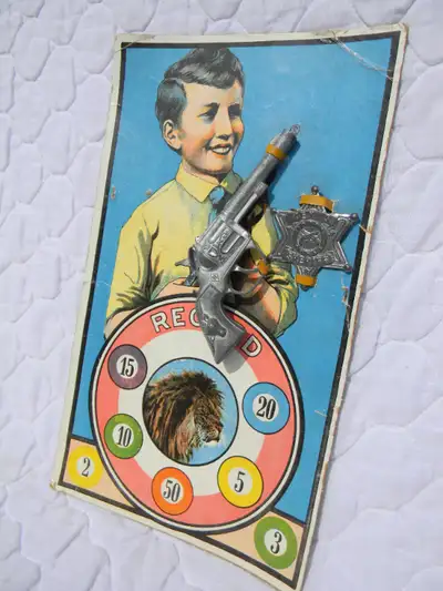 Antique toy cap gun pistol and sheriff badge - original package, View more