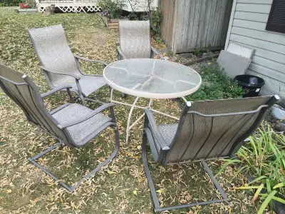 Patio Set, four nice chairs and a around table, View more