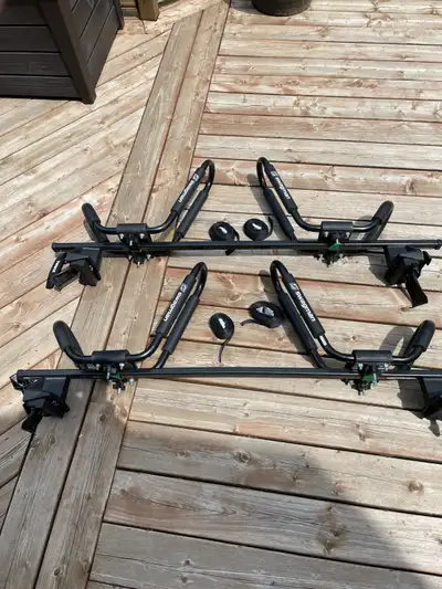 Thule rack system for two Kayaks. Bought to fit a 2016 LX Honda Civic Sedan. In very good shape. Str...