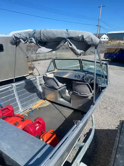16 foot aluminum welded boat with 90 hp four stroke Evinrude and 6 hp four stroke kicker. Needs new...