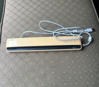 Scan your documents on the go with this used Neat portable scanner, perfect for receipts, business c...