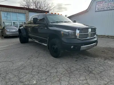 2008 mega cab Dually. Awesome truck used to haul horses. Heavy hauler trans, bd turbo, head gasket a...