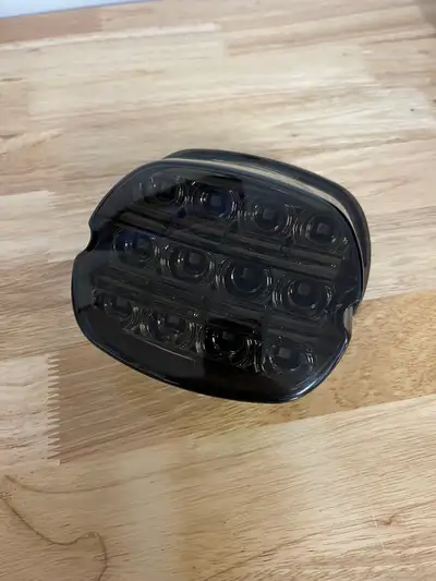 Near new LED tail light Brake and running light Smoked lens Fits Dyna, road king, electraglide, soft...