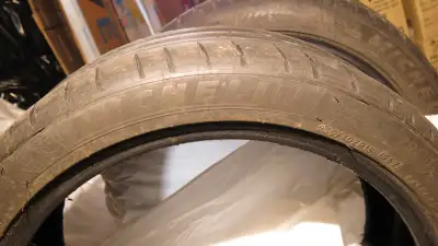 1. A pair of two Michelin Pilot Sport 4S summer tires in 235/40ZR19 96Y size. They are in fair condi...