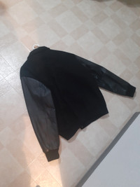 Fleece jacket with leather sleeves 