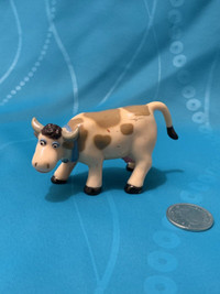 Vintage Gladys the Cow figurine from Sesame Street