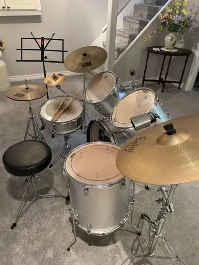 Full acoustic kit Additions include: 8" splash cymbal, 20" ride cymbal, cowbell, 3 cymbal booms, sta...