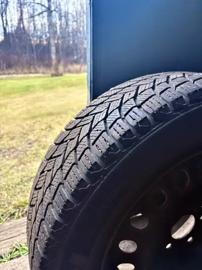 Full set of winter tires with rims – Excellent condition Used for only one season, still have 90% tr...