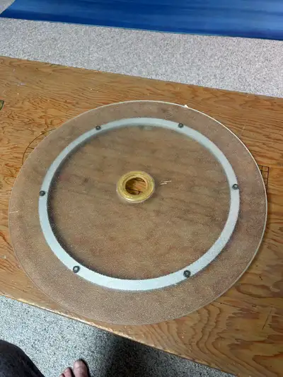 Add a touch of convenience to your outdoor dining with this used outdoor table "Lazy Susan," designe...