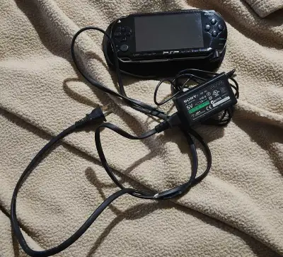 Original PSP Playstation. Works great. Plug and case included. $50 obo