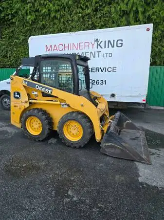 2012 john deere 313 skidsteer with 2700hrs. Enclosed cab with heat. quick attach coupler. hand contr...