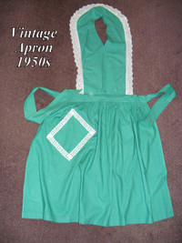 Vintage women’s apron, 50s, green bib style, lace trim, fits all