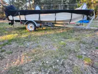 14 foot fiberglass boat with brand NEW motor