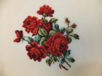 Petit Point Red Rose Bouquet in 3 thread. 6.5”x7”. $50.00.