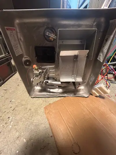 Selling a Suburban SW12DE RV water heater, 12 U.S. gallon capacity, 12,000 BTU/HR. The unit has mino...