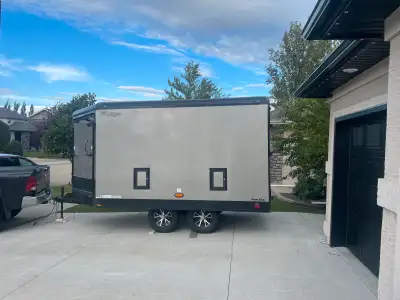 Looking for a 8.5x16 snowmobile trailer similar to above photo. Can be 12’+4’ vee. Text 780 914 7638