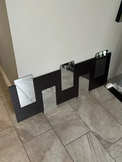 Mirror is the brown frame, View more