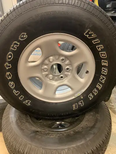 Original unused spare tires on rims. 6 bolt General Motors mounting pattern. 1 (one) each in sizes i...