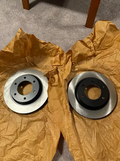 Selling brand new FRONT brake pads with hardware and brand new FRONT brake rotors for 19 - 23 Ford R...