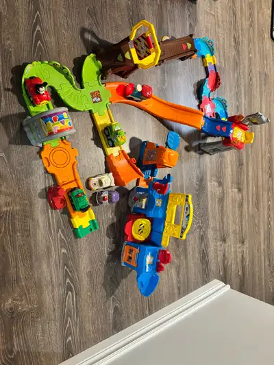 Selling a fun VTech Go! Go! Smart Wheels playset bundle in great used condition. Perfect for toddler...