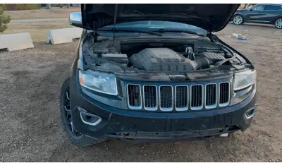 CASH SALE ONLY!!! 2014 Jeep grand Cherokee Limited 5.7 L hemi. This beast has four newer tires rims...