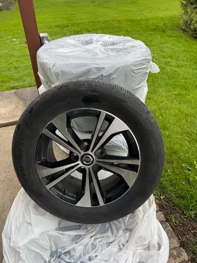 Pretty well brand new M+S tires on factory alloy rims 205/60R16. Came off a a Nissan Sentra Used for...