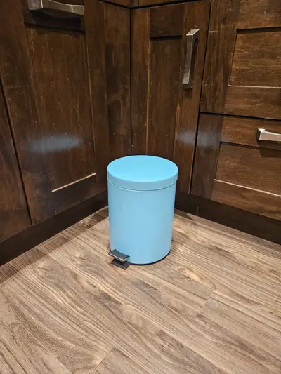 Aqua blue small step open metal garbage can $10, View more
