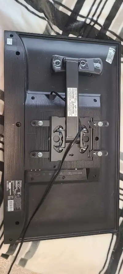 Hisense Smart TV with wall mount, View more