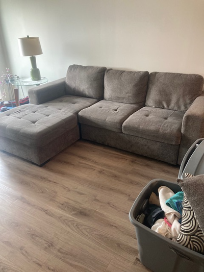 Modern grey couch with chaise and storage, View more