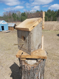 Rustic bird house for sale.