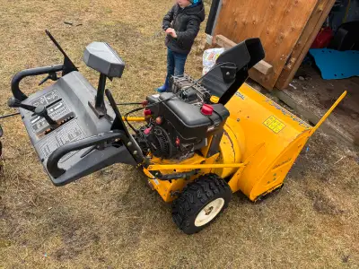 For sale is a Cub Cadet snow blower, featuring a 30-inch clearing width and an 11 HP engine, perfect...