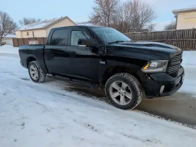 Absolutely LOADED black Ram 1500 4x4. Has every feature available for this model. Remote start, seat...