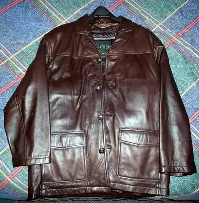 Never worn. Danier leather jacket brown new condition, size medium to large. Button Front Blazer. In...