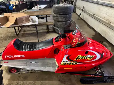 2002 Polaris 340 Indy electric start,fan cooled hand and thumb warmers 1395 original miles mint cond...