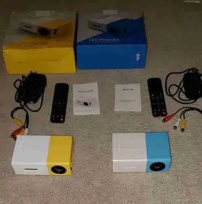 I am selling 2 nice little LED projectors. They are quite cheap and easy to use, just plug in an HDM...