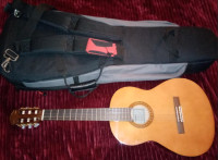 Yamaha classical guitar with backpack case