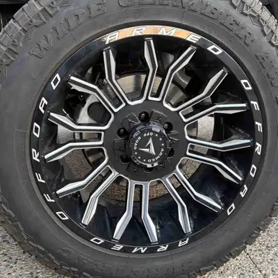 For sale - a set of 20” custom forged wheels, gloss black with chrome accents. 2024 Ford F 150 Tremo...
