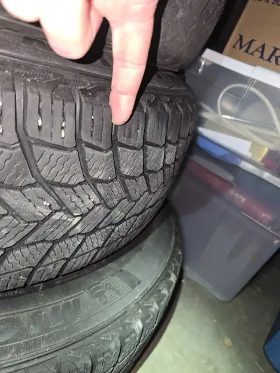 4 Michelin X-Ice tires available 2 used for two seasons with steel rims, 2 are bald (bad struts) but...
