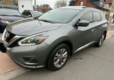 This grey 2018 Nissan Murano is the perfect SUV, crossover for all your driving needs. Used, it's st...