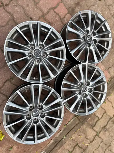 Size: 17x7J Offset: 50 Bolt pattern: 114.3x5 I'm selling a set of four Mazda rims that would be an i...
