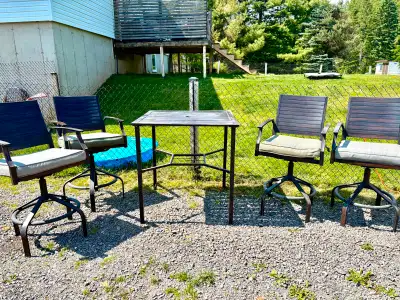 Patio set, bar height. $100 Chairs are in good shape, table has rust spots coming through on top (se...