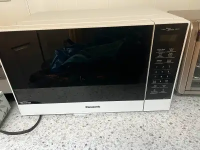 Panasonic microwave not used very much couple of years old works great. Medium size and model number...