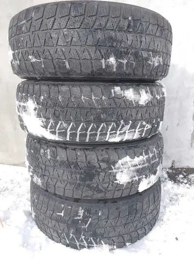 4 Winter Tires Blizzak on Rims, came off a Dodge Caravan