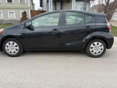 MUST SEE! 2015 Toyota PriusC, Fully loaded Excellent on gas, clean, reliable and fully equipped dail...