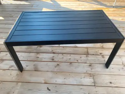 Black Aluminum Coffee Table. Came with a set but it was too large for our small deck. Brand New $110...