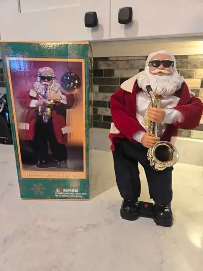 Vintage Animated Dancing Saxophone Santa, View more