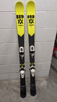 Child's VOLKI skis, SOLOMAN boots, poles