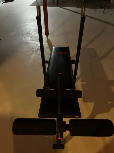 York Bench Press - $100 Barbell Bar - $90 Together - $180 Both lightly used, bench includes leg exte...