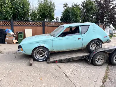 Classic 1975 American Motors Gremlin restoration project. It has the original 4.2 L inline 6 and rar...